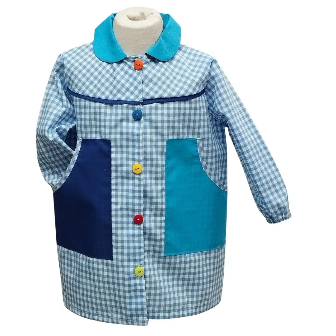 Babi o bata escolar modelo bolsillos oblicuos color azul